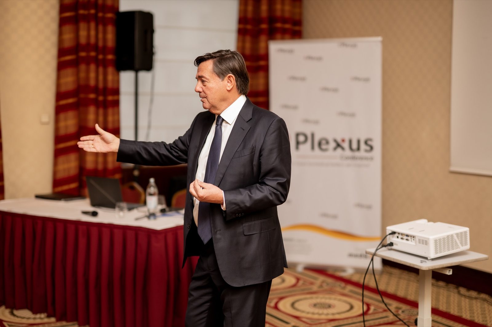 A speaker addressing a Plexus Conference session